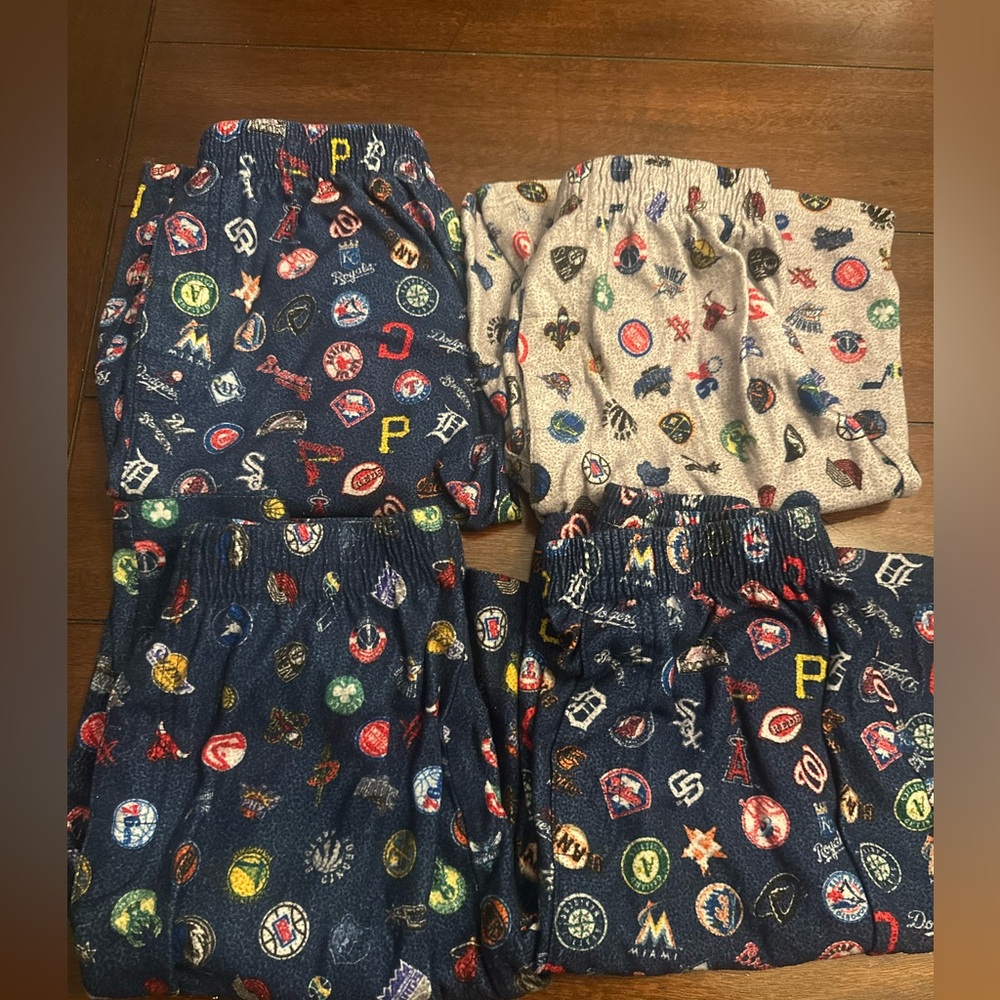 4 pairs of sports pajamas shorts, baseball and basketball size 8/10 medium